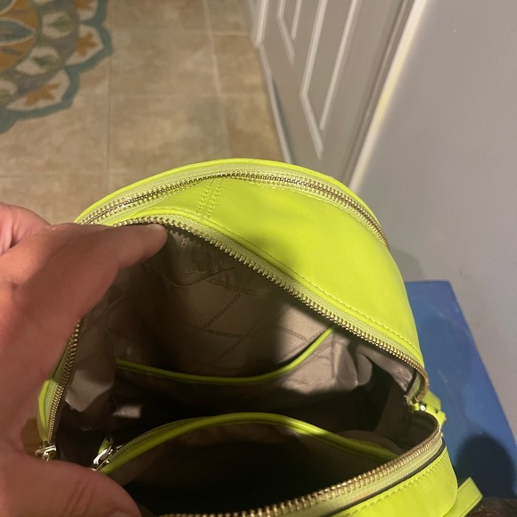 Gently used in excellent condition Michael Kors neon green back pack purse. - Picture 8 of 8